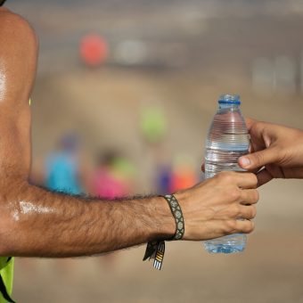 Drinks station at a trail running marathon,hydration drinking during a race