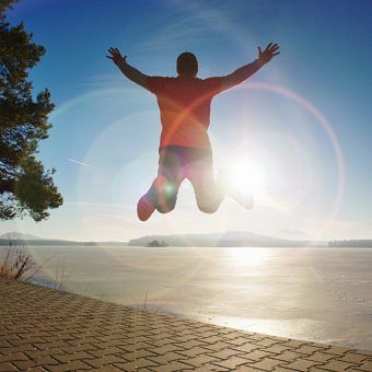 bigstock-Tall-Man-Jamping-By-Sea-On-The-304940122