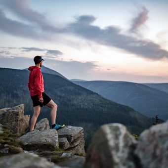 bigstock-Man-Celebrating-Sunset-Looking-243828220