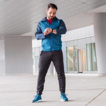 bigstock-Sportsman-Checking-Sportwatch–267953911